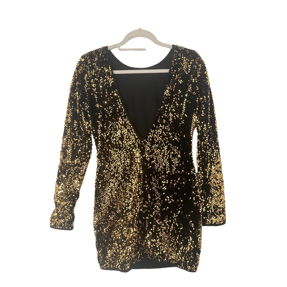 Black low v neck privy dress with gold sequins